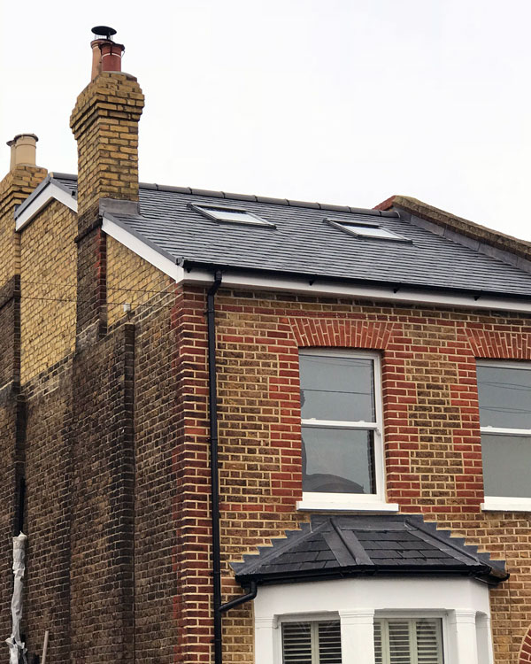 construction company in Epsom and Surrey grey slate roof construction and conversion of semi-detached house